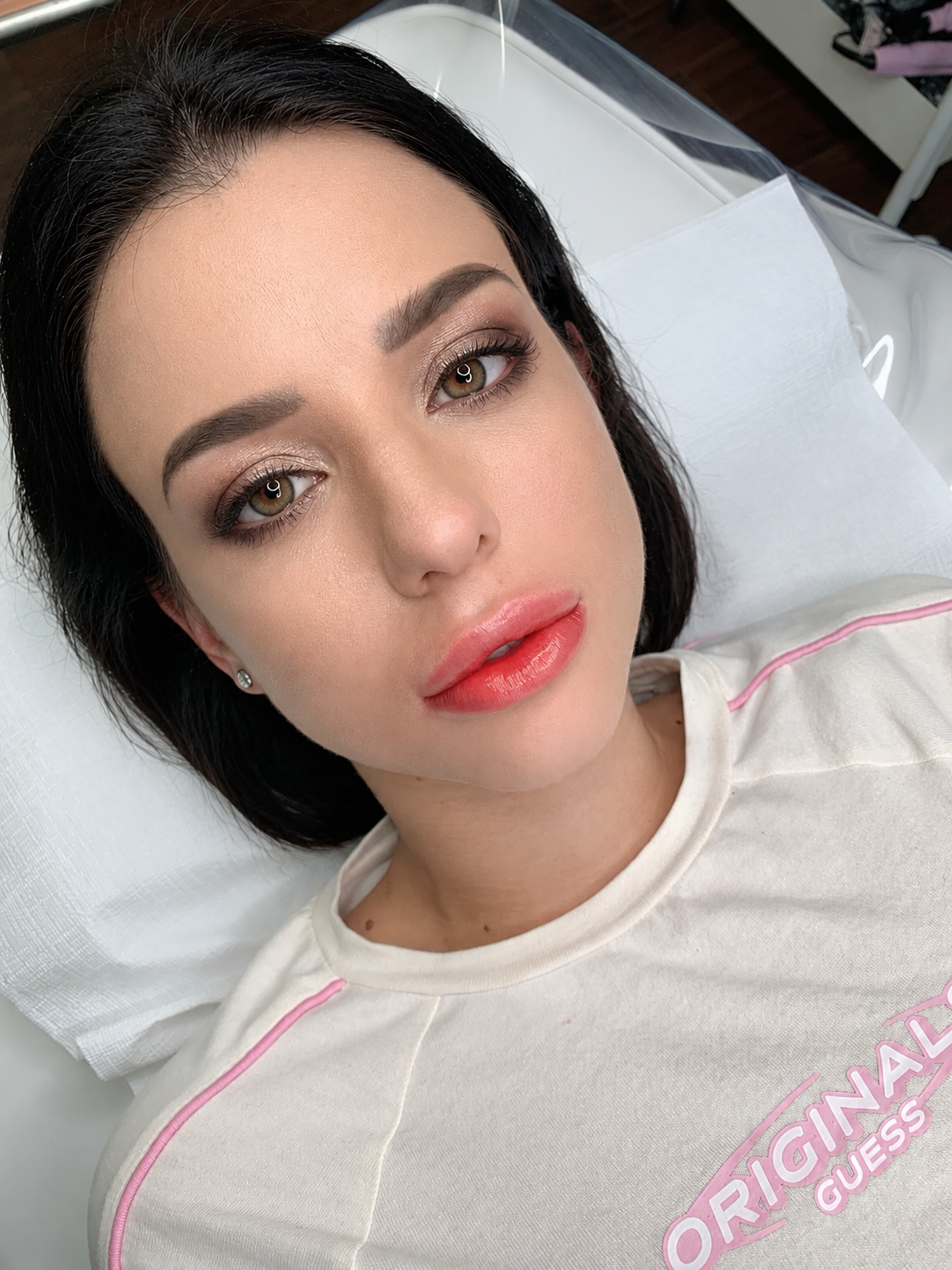 Perfect Line client after lip blush, lips a clear coral with a defined border